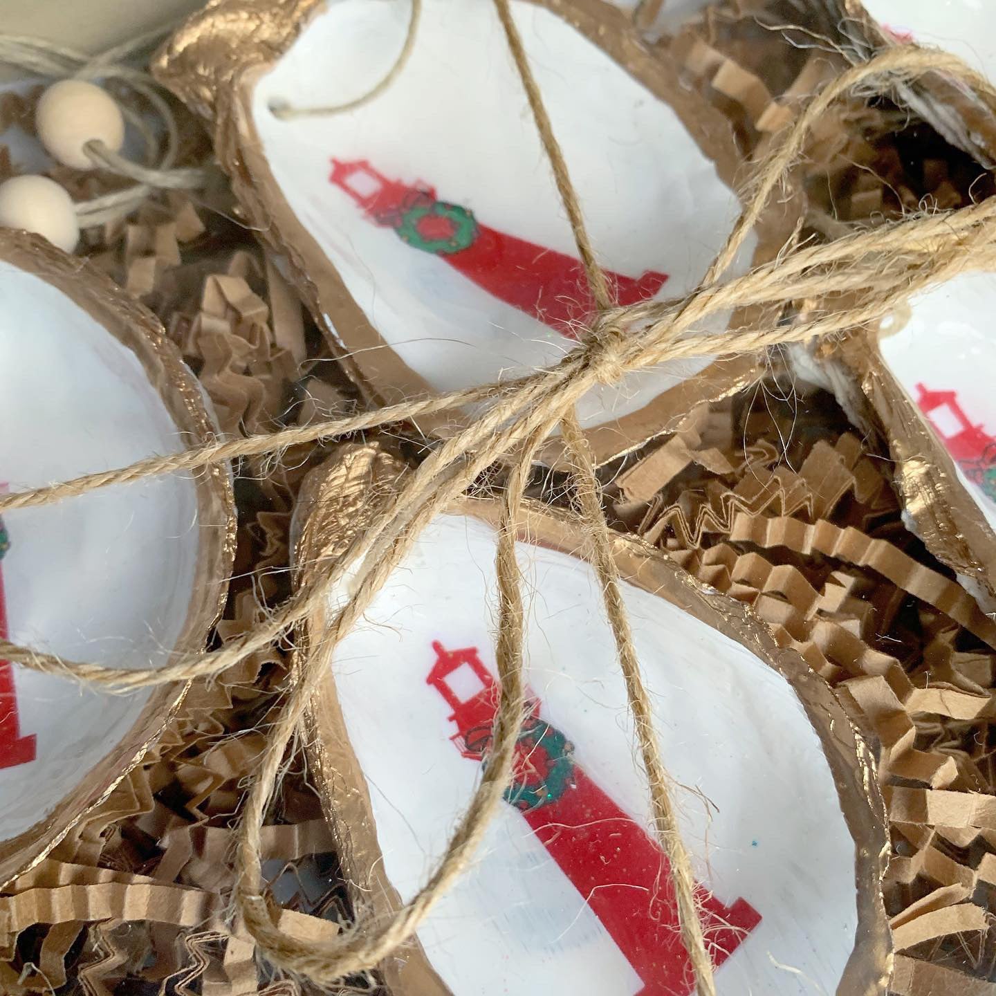 close up of christmas lighthouse ornaments