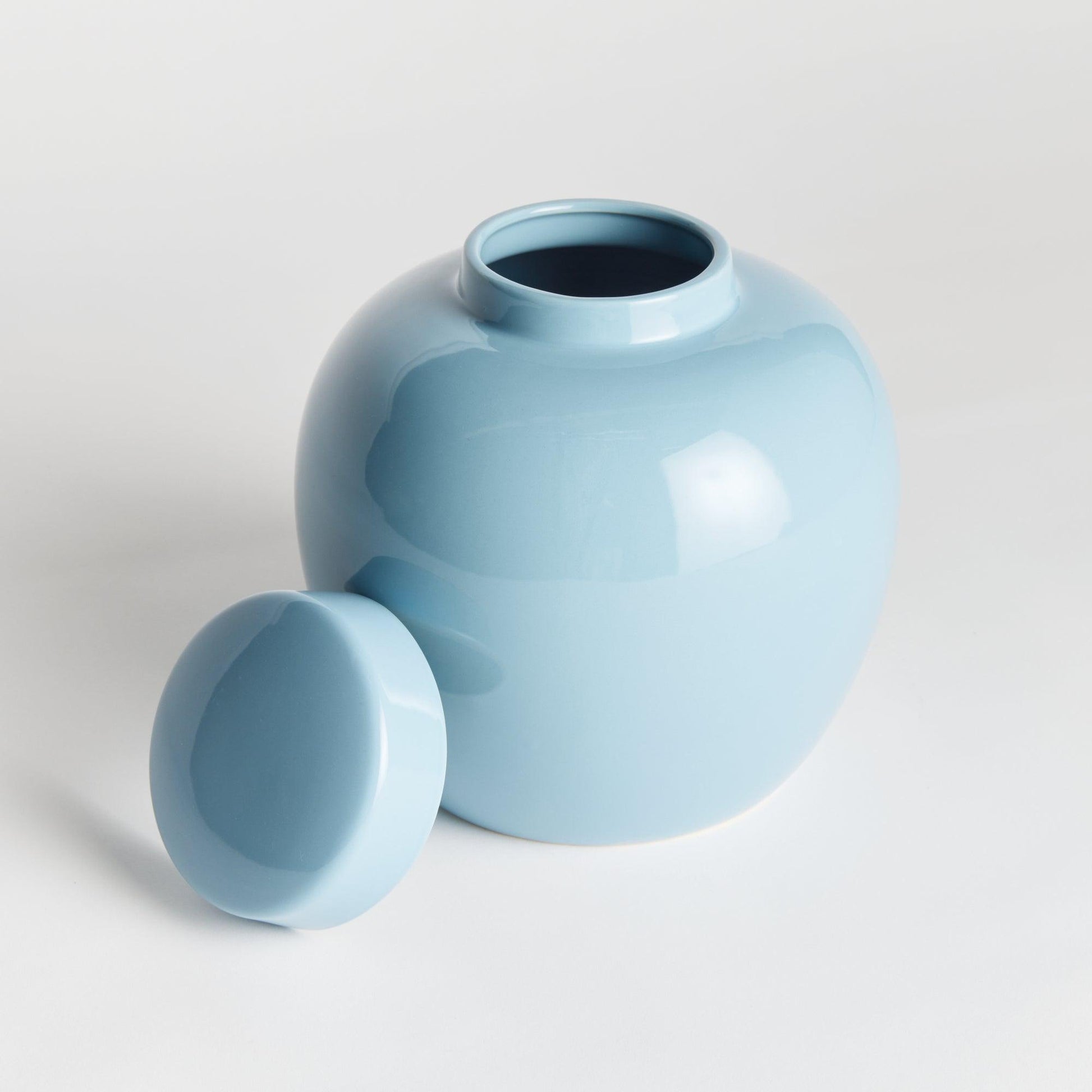 Light blue jar with lid off 