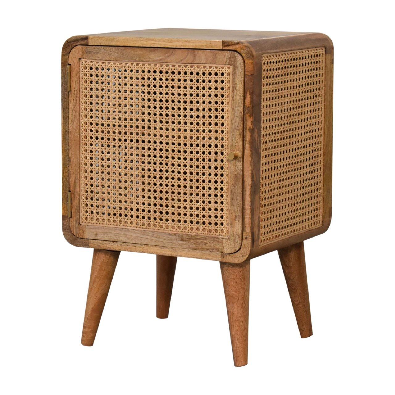 a small wooden table with a rattan top