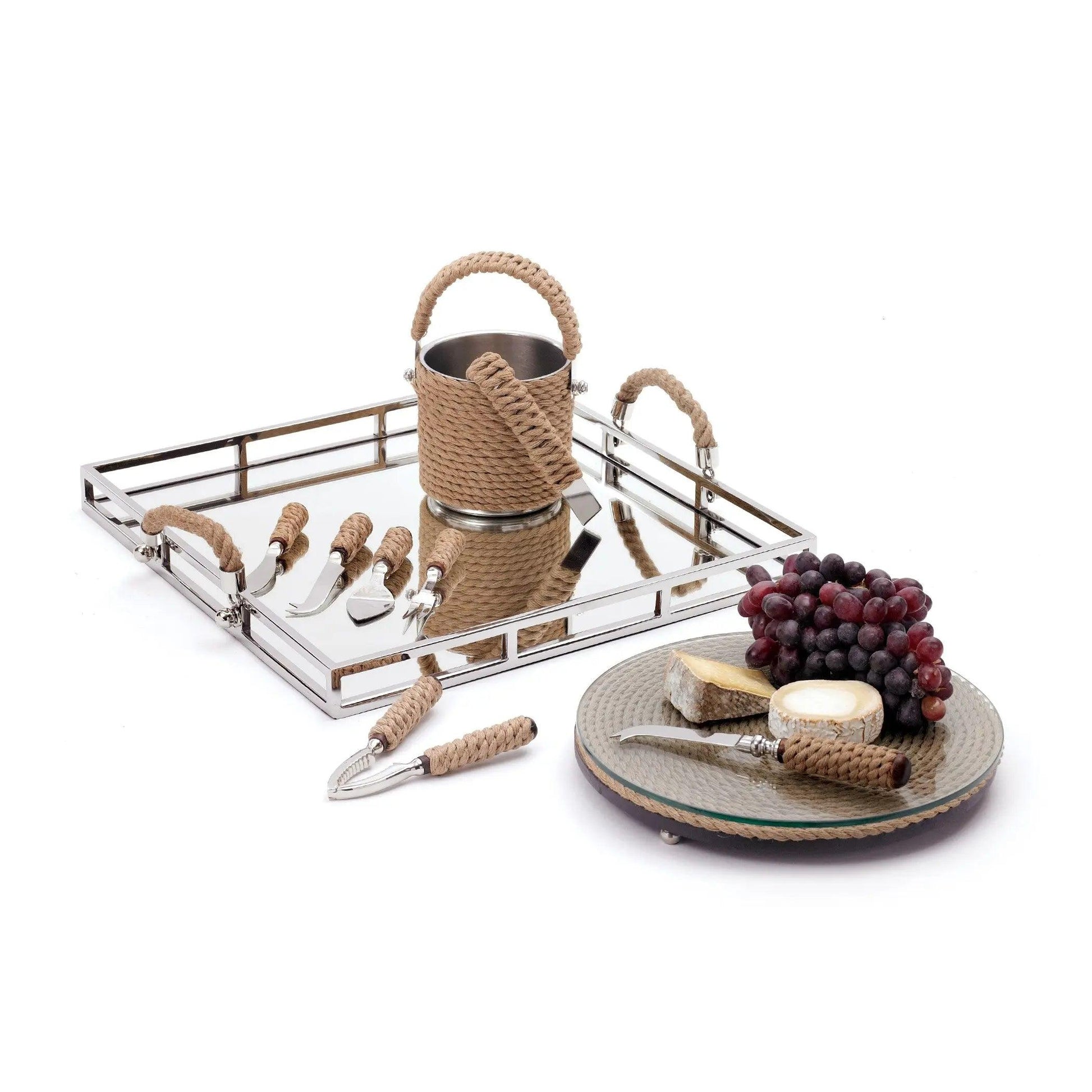 tray with barware and cheese and grapes