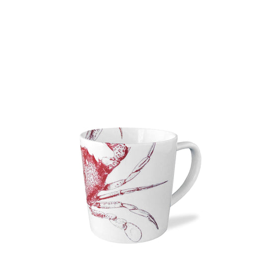 a white coffee cup with a red flower on it