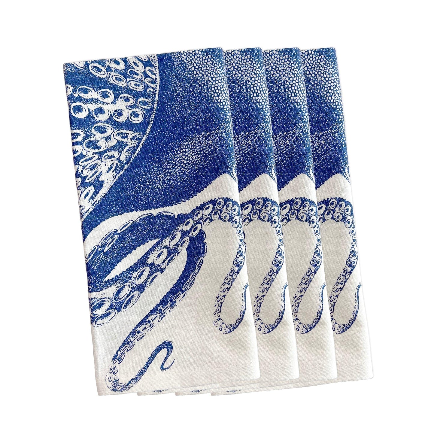 a set of four blue and white octopus napkins