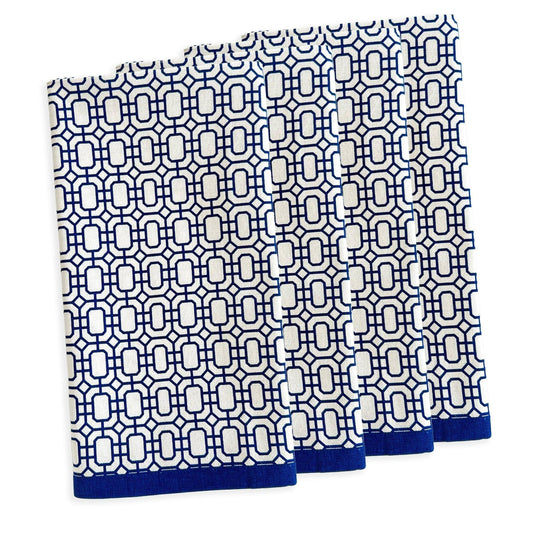 a set of three blue and white napkins