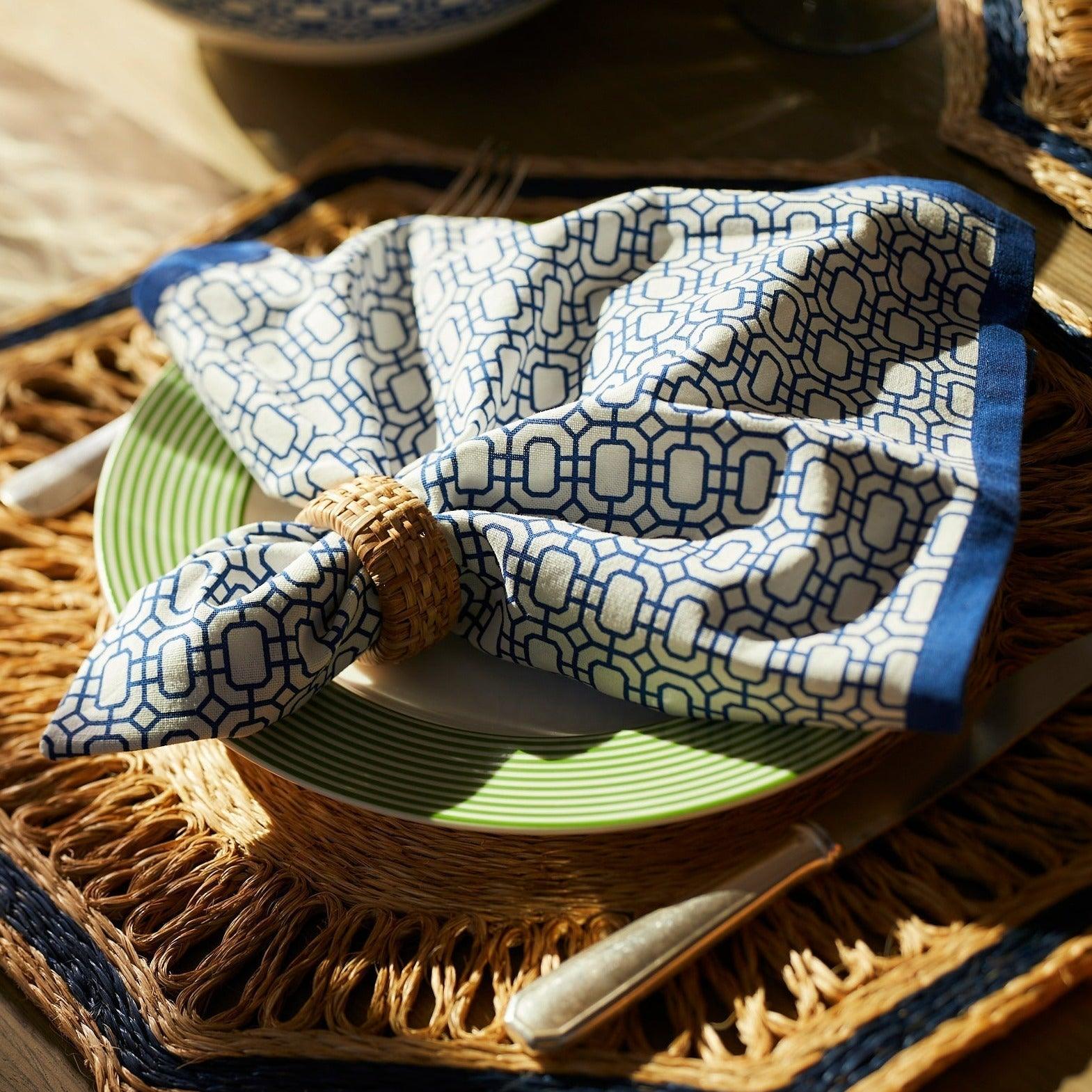 a close up of a plate with a napkin on it