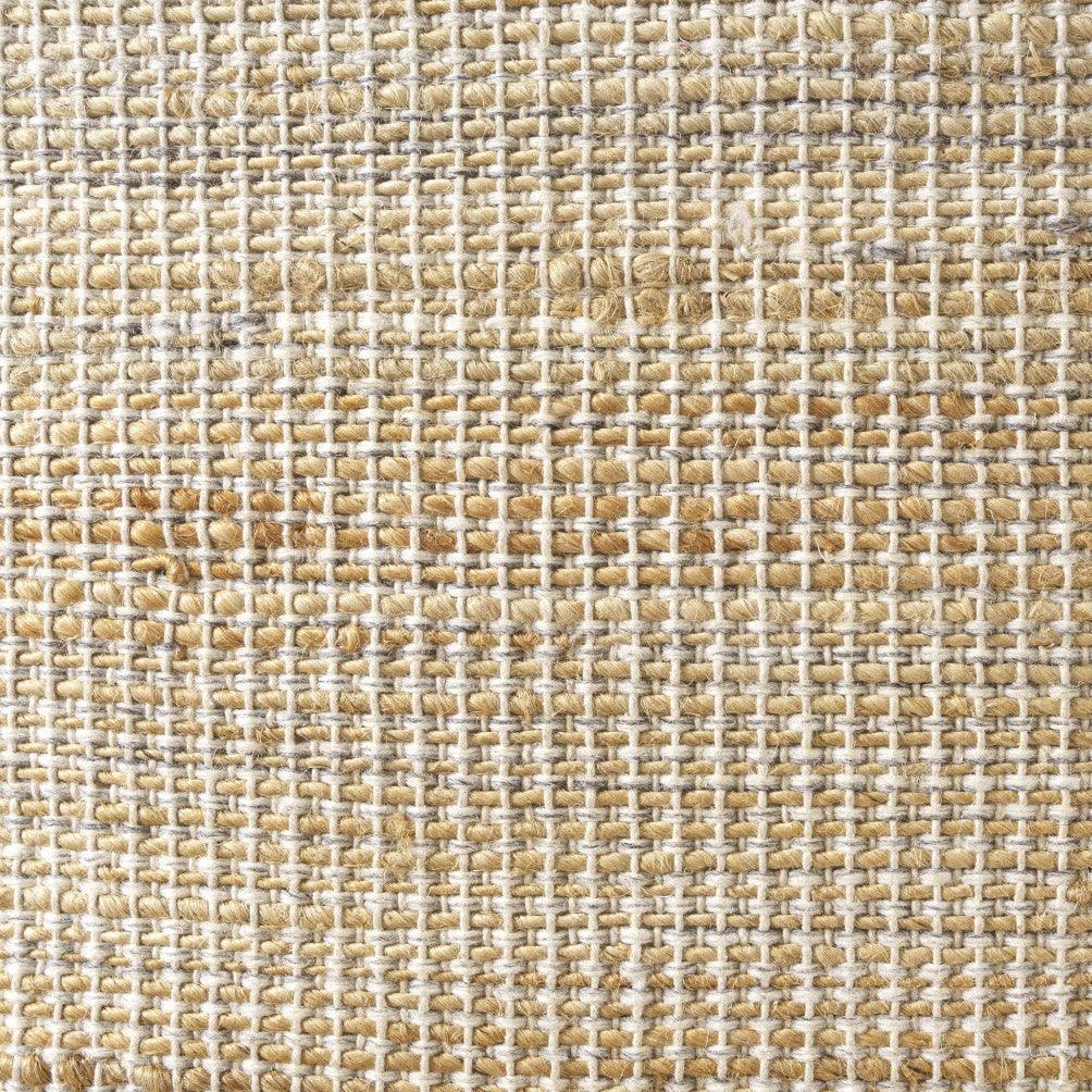 a close up view of a beige fabric texture