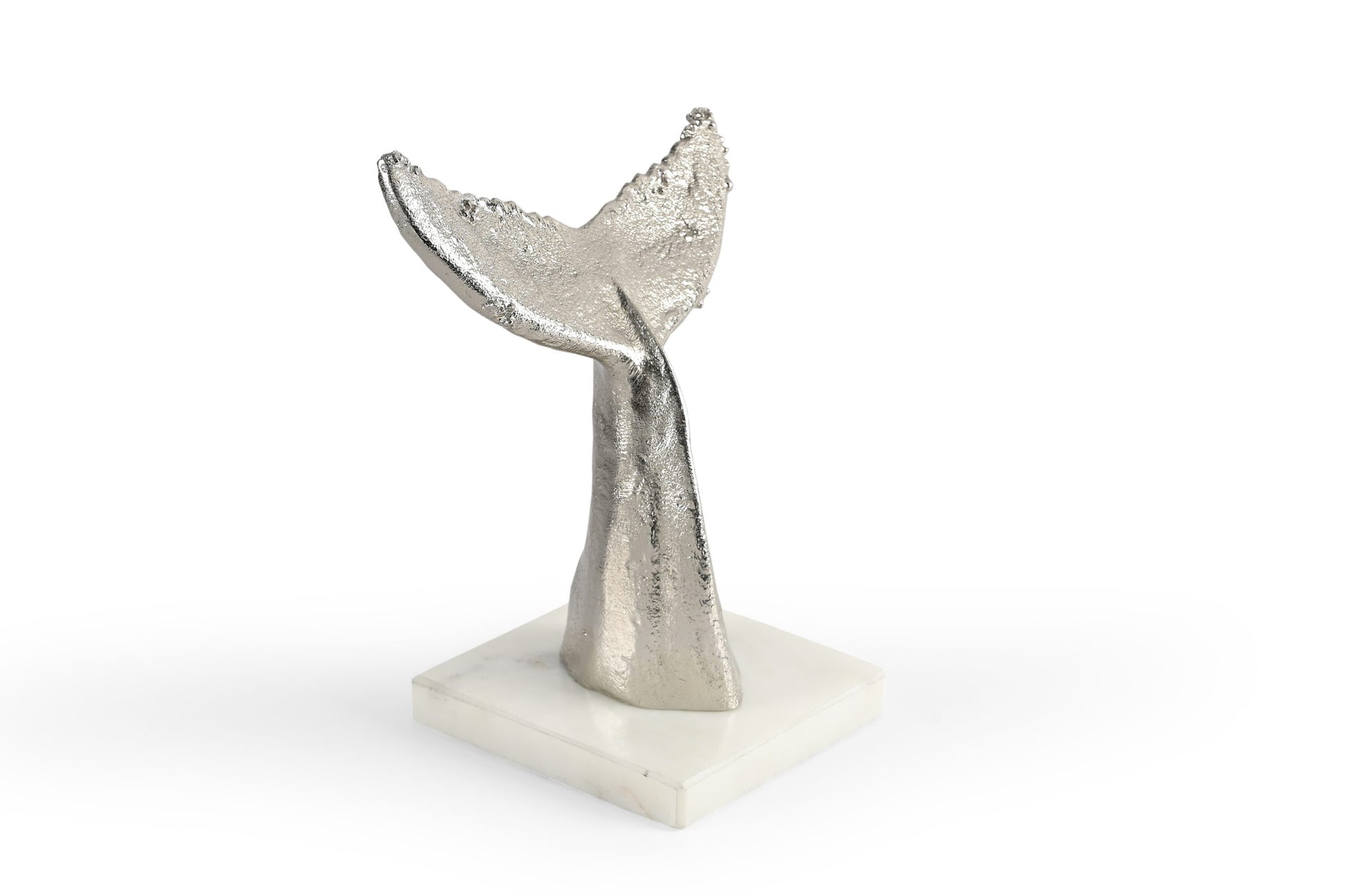 silver whale tale sculpture