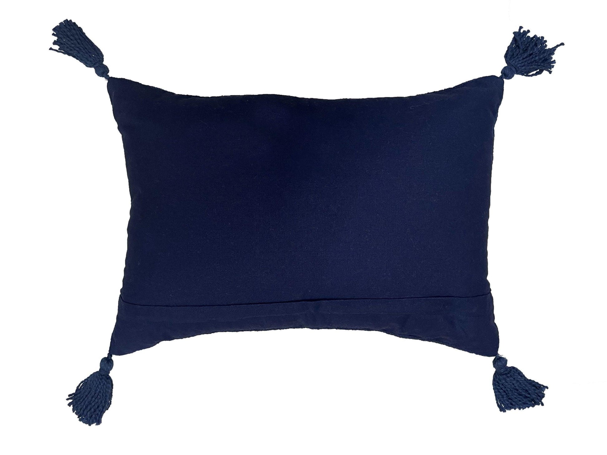 Back of navy-blue pillow with tassels