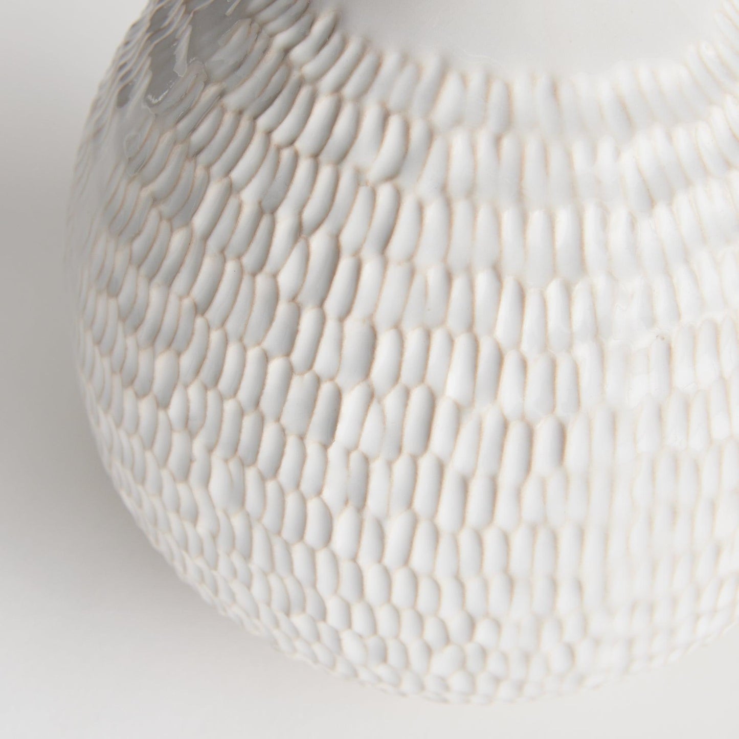 Close up of white textured vase 