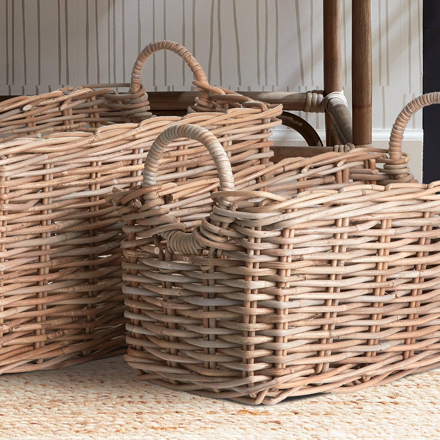 three wicker baskets sitting on top of a rug