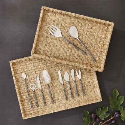 two rectangle woven trays with utensils