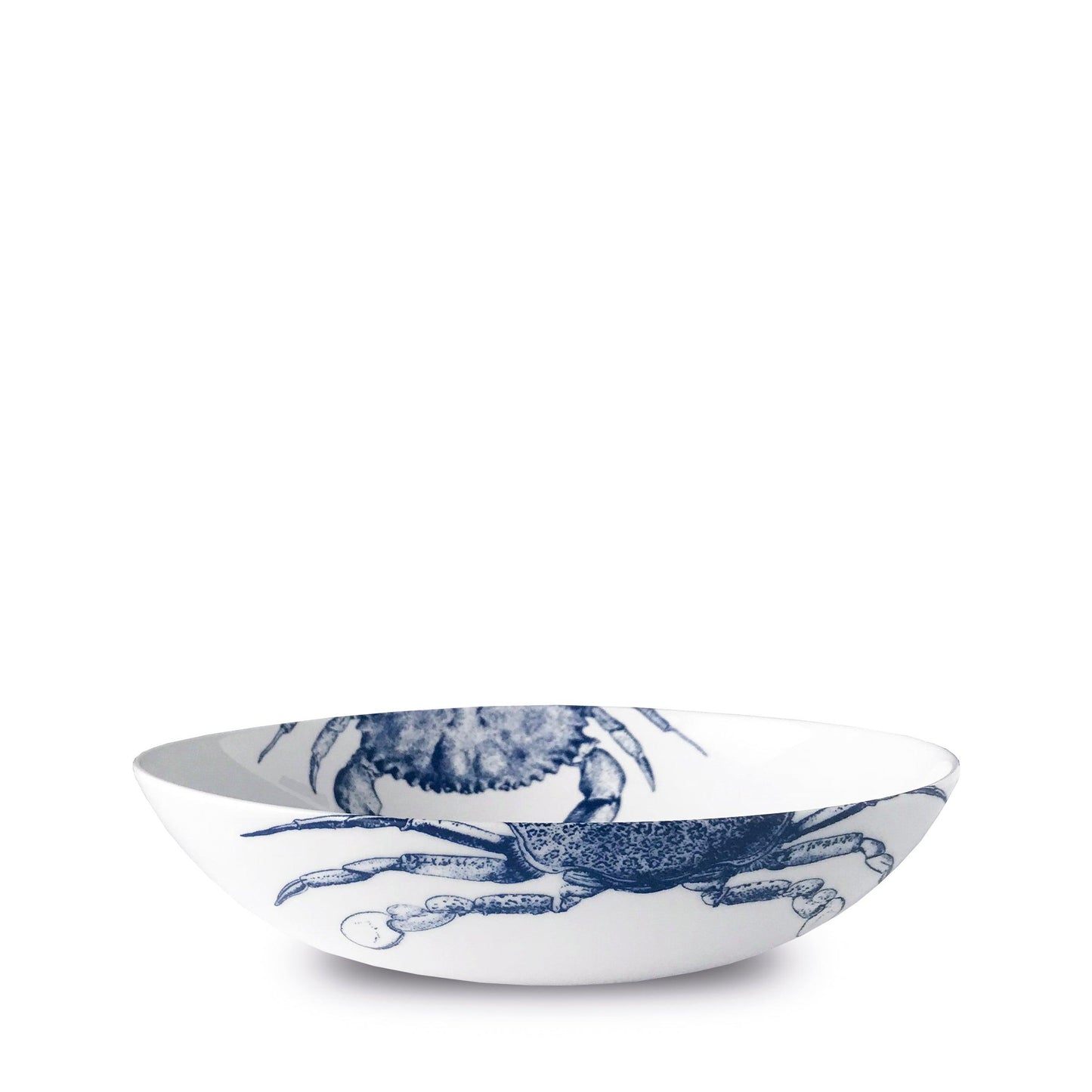 a blue and white bowl with a crab on it