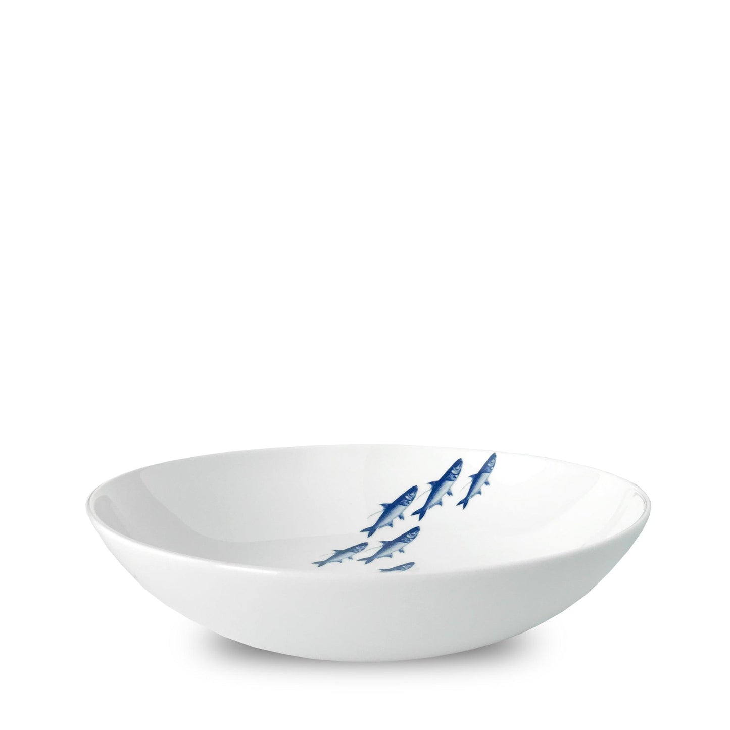 a white bowl with blue fish on it