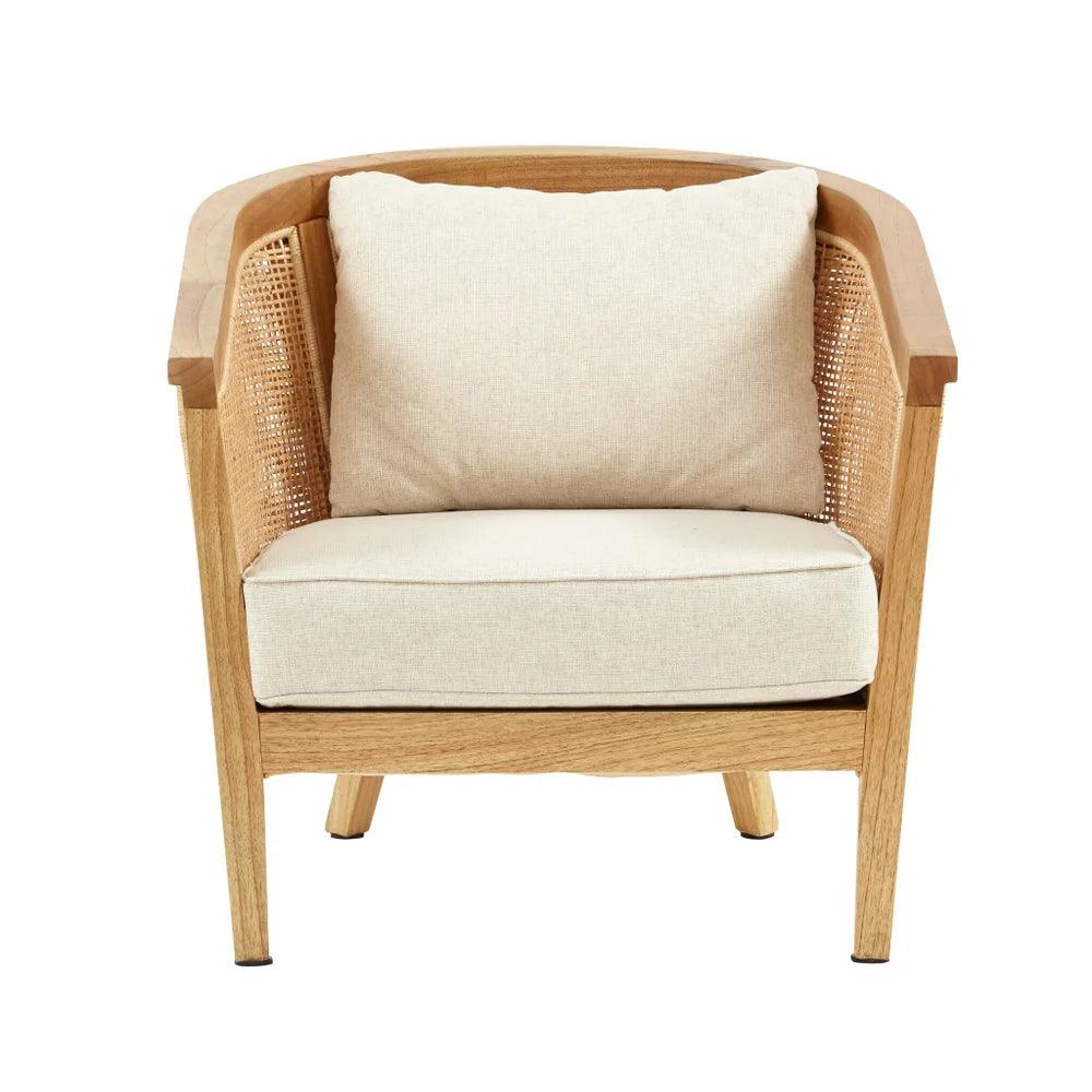 a wooden chair with a white pillow on top of it