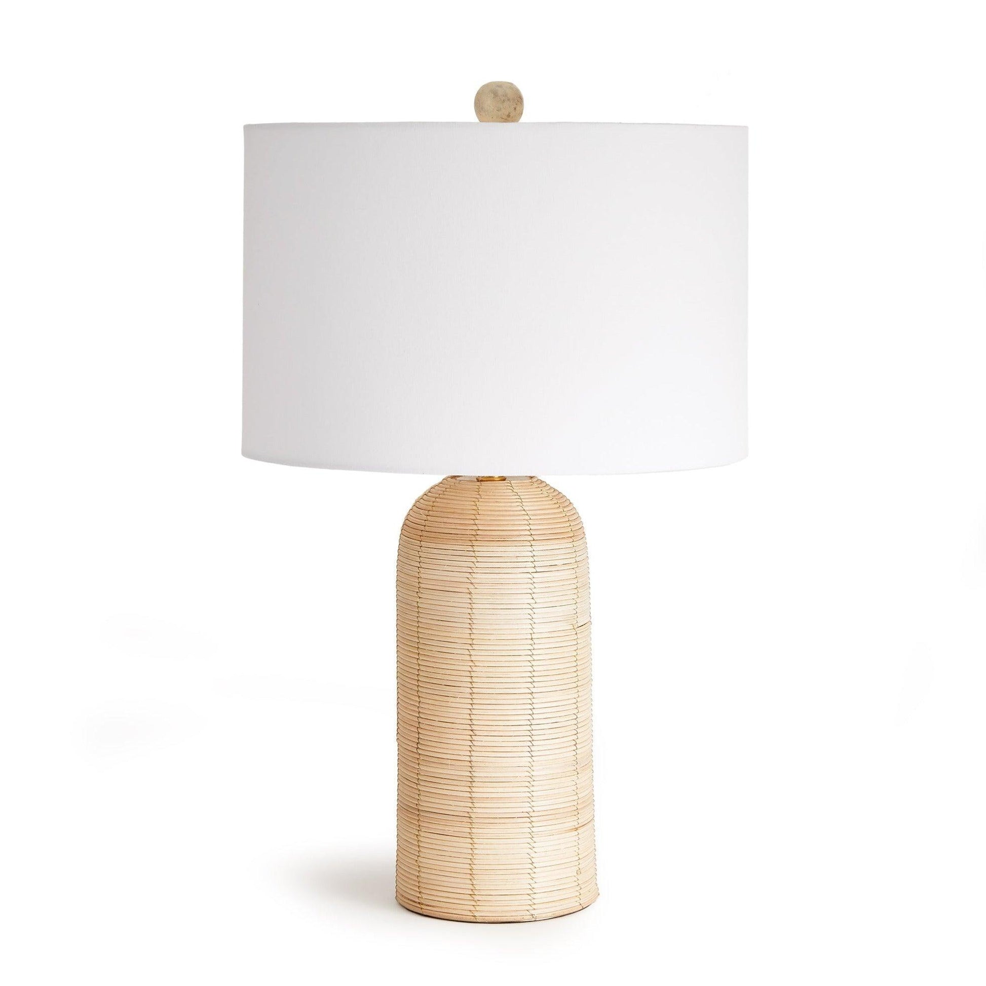 a table lamp with a white shade on it