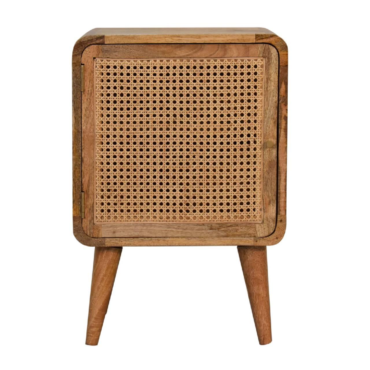 a wooden cabinet with a rattan design