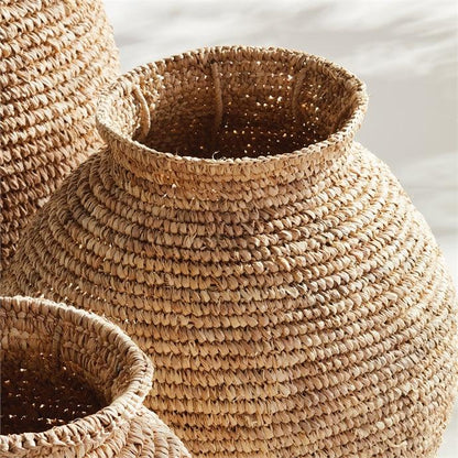a close up of two baskets on a table