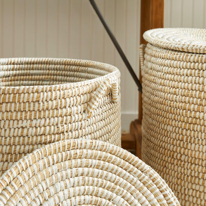 a close up of two baskets on the ground