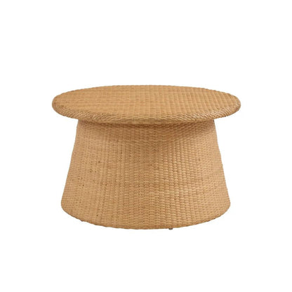 a round wicker table with a white background