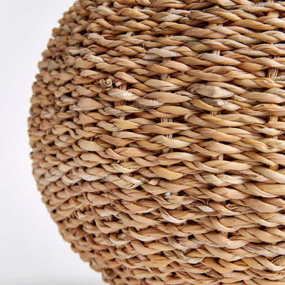 a close up of a vase made of wicker