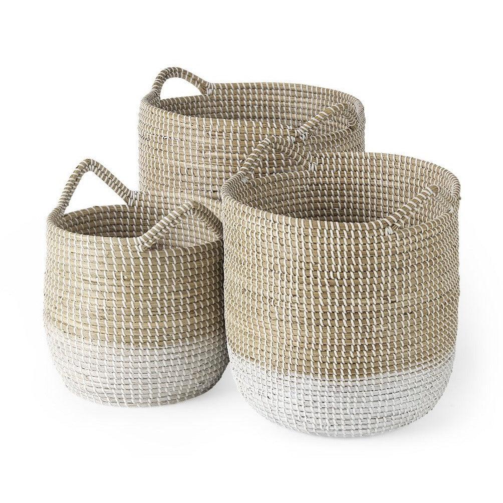 three woven baskets sitting next to each other