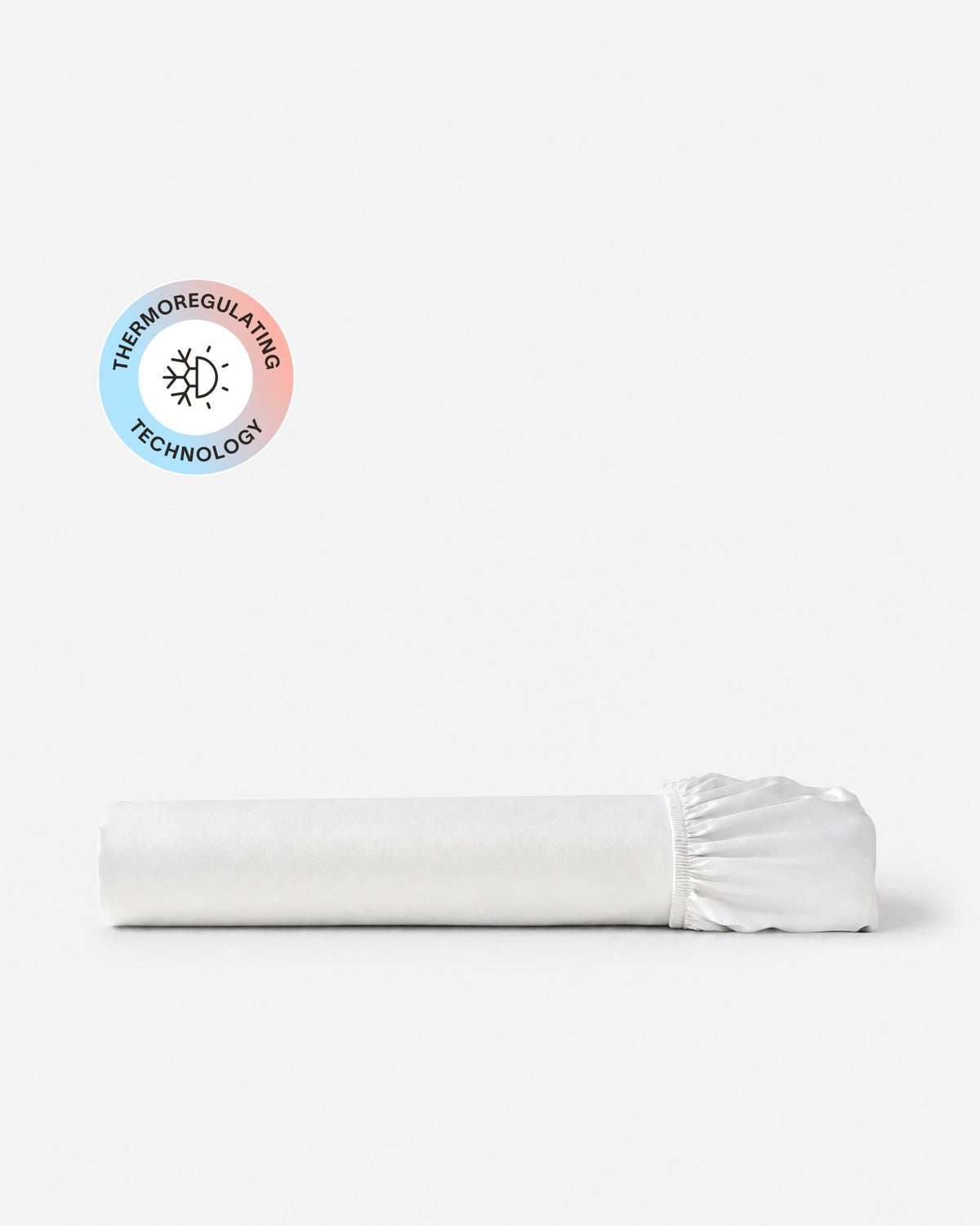 Folded Porto white cooling fitted sheet showing its elastic edge and a temperature-regulating badge