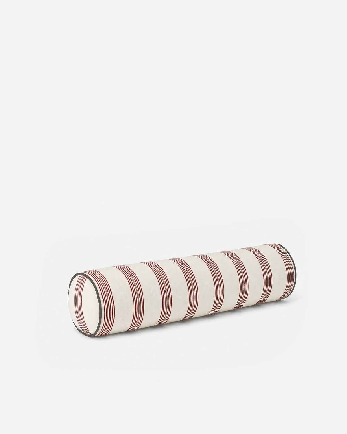 Rimini cylindrical bolster pillow with terracotta and off-white stripes and dark piping, shown at an angle