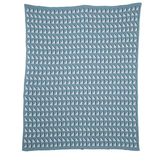 a blue and white blanket with a pattern on it