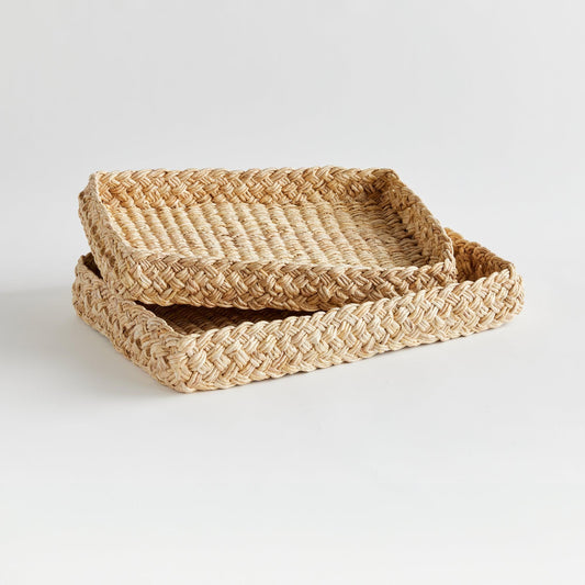 two braided wicker trays