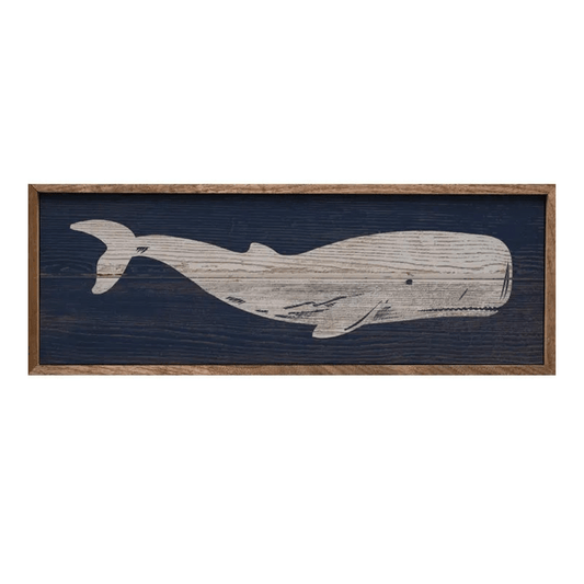 wood painting of white whale on blue background