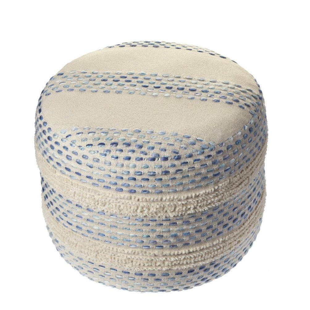 a blue and white round pouf on a white background