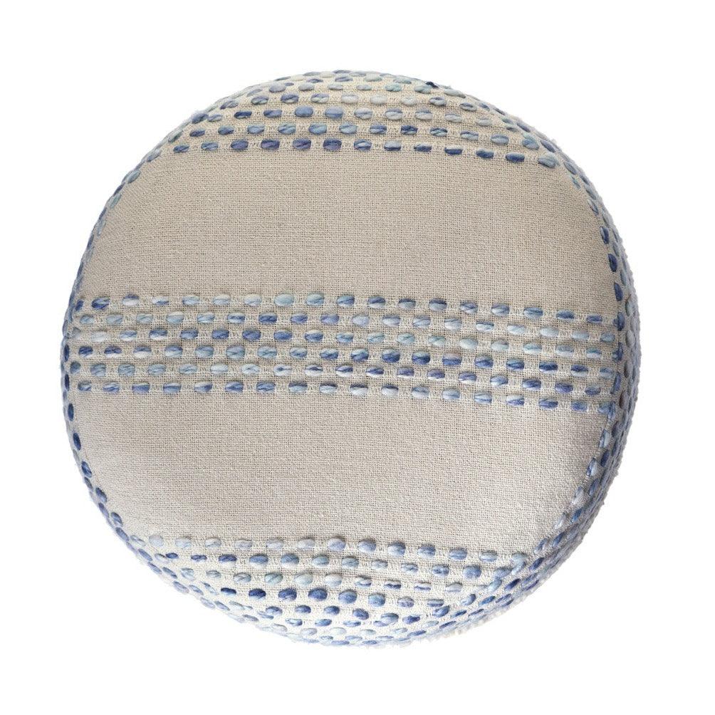 a white and blue round cushion with a striped design