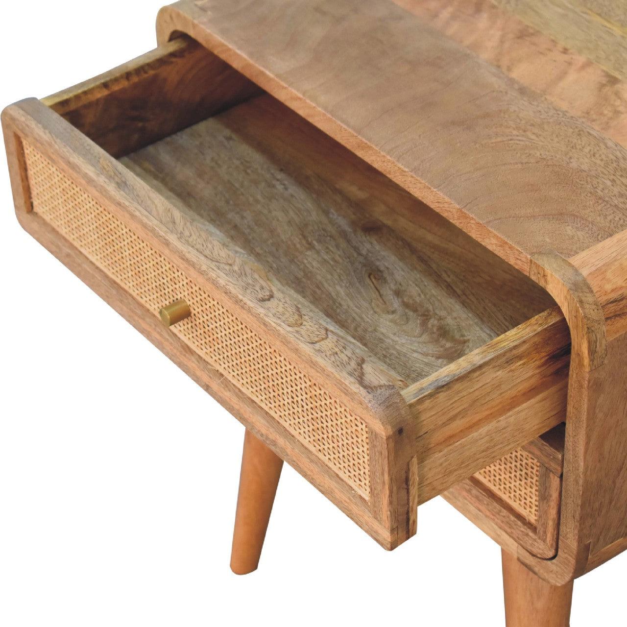 a wooden table with a drawer on top of it