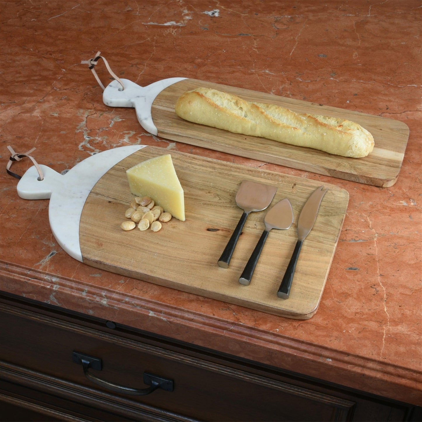 two wood boards with bread and cheese